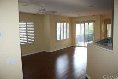 Spacious living space opens to large patio.