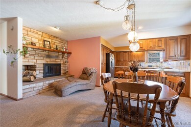 Other side of fireplace in dining area