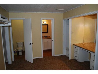 Other. 16  x 10  Master Closet featuring granite c