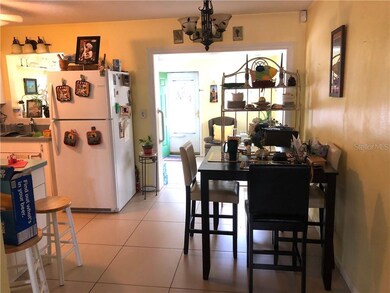 Kitchen/dining area looking out to bonus room