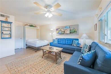 Zoom in to the 3-d art above the couch. A one-of-a