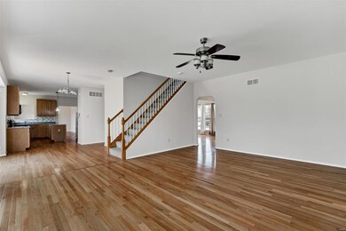 Rear staircase to spacious 2nd floor.