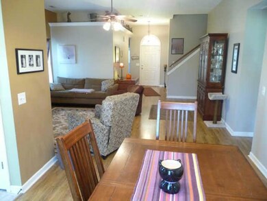 Another look from the dining room toward the foyer. The stairs leading to the bonus room over garage.
