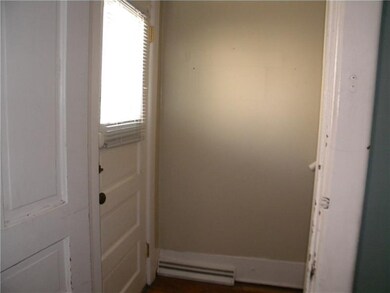 2nd front entry leads to the upper level