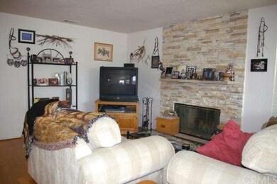 Cozy Family room with Rock Fireplace