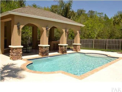 Entertainer's Delight Outdoors With Custom Pool, Stacked Stone Accents And Waterfall Feature