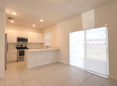 12322 NW 23rd Ct, Miami, FL 33167 - photo 5