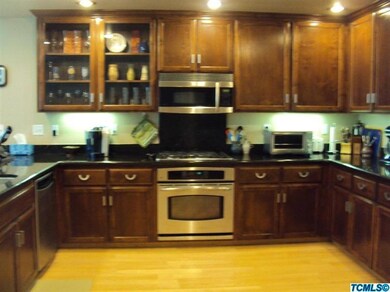 Gorgeous kitchen with granite counter to