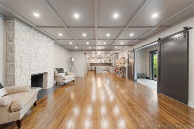 Custom built fireplace with dramatic tile work and