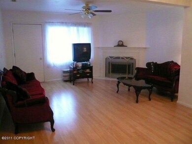 Living room w firplace & private deck