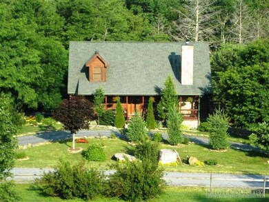 Home-Close Up: Home has a nice circular drive out front, a one-car garage on the side, and plenty of space front, back and sides to neighbors!