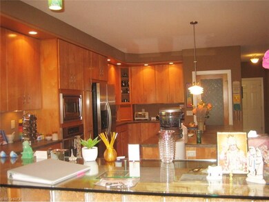 Kitchen lots of cabinets built in microwave and re