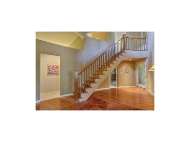 Enter the home to the second level landing with gl
