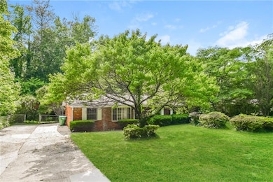 View of property hidden behind natural elements fe