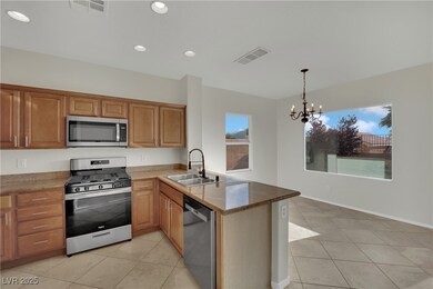 Kitchen featuring stainless steel appliances, a pe