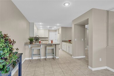 Kitchen with breakfast bar, granite counter tops a