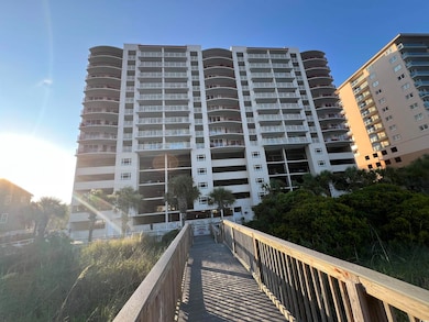 Beautiful building!  Swimming pool, hot tub and lazy river are all situated between the building and the beach with decking that goes straight out to the beautiful, sandy beach that is private for owners and guests to use and enjoy.