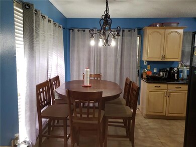 Dining with French Doors leading to Patio