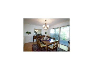 Large formal dining room with beautiful wood floor