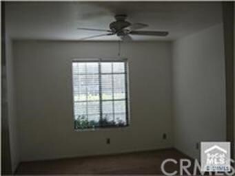 Spacious master bedroom wtih ceiling fan and it's 