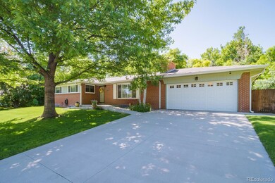 2 car garage with workbench, new driveway, sidewalk and front porch.
