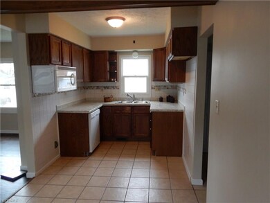 New kitchen with tile floors