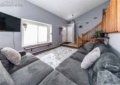 Living room featuring hardwood / wood-style floors