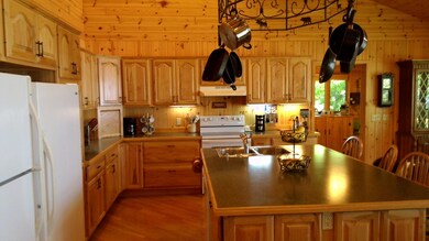 Large Open kitchen with island sink bar