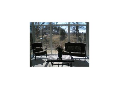 Sun Room. Floor to ceiling glass with glass door l
