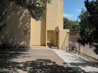 View of side of property with stucco siding and f