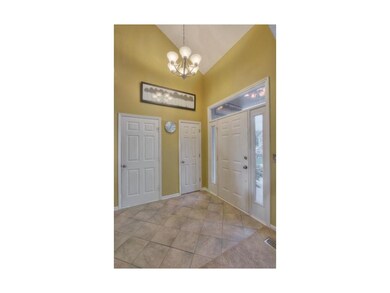 Soaring Light Filled Two Story Entry with New Tile