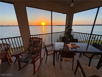Sunroom / solarium with a water view