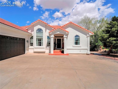 Mediterranean / spanish house with a tile roof, st