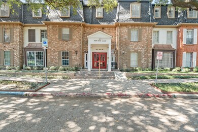 The entrance has a ramp, and a beautiful brick ext