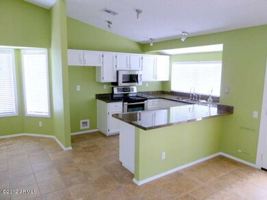 Slab Granite & Stainless Appliances