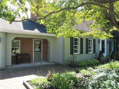 Exterior Front. A WARM AND WELCOMING FRONT ENTRY.