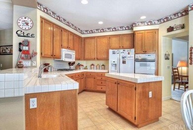 Gleaming kitchen with center island and loads of c