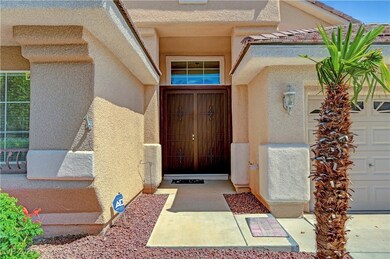 Entrance to property with stucco siding