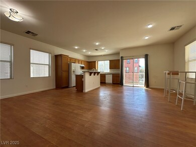 Unfurnished living room with dark wood finished fl