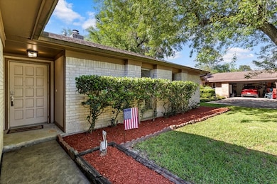 Freshly mulched landscaping as you walk up to the