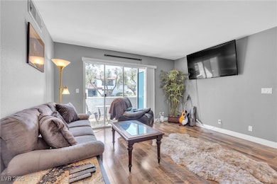 Living area with Laminate wood finished floors and