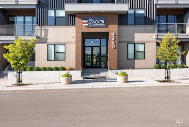 Entrance to property featuring brick siding
