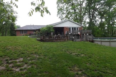 View of Rear of Home, Pool and Decks.