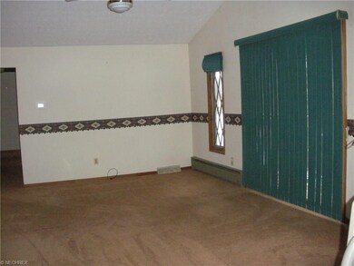Great family room off of kitchen with a fireplace 