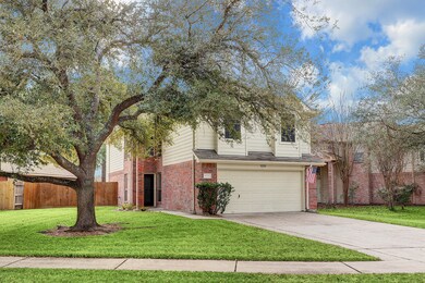 The lot sits on a nice curve adding character and curb appeal.  Take a look at the lovely oak tree in the front yard.