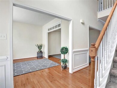 LOVELY TWO-STORY FOYER WITH HARDWOOD FLOORING, OPE