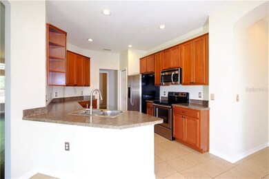 Spacious Kitchen overlooking Family Room with ampl