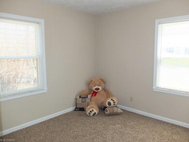Bedroom 3 with new carpet.