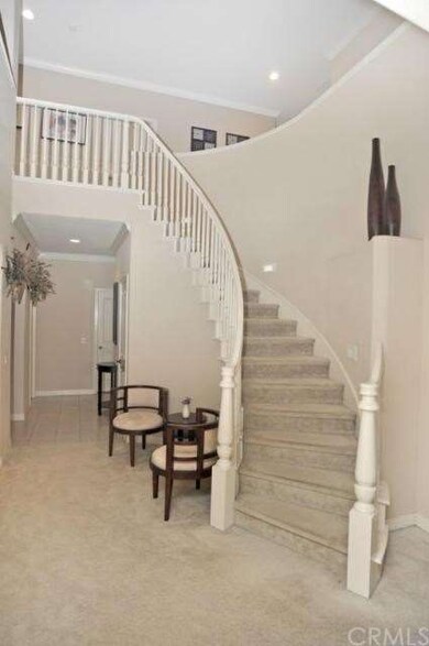 View of staircase from dining room area