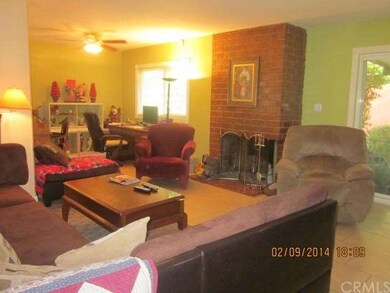 The inviting living room with the fireplace and a 